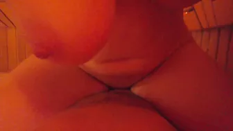 Redhead babe with big tits enjoys sauna session.