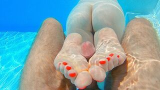 Seduced by a ginger mermaid in an underwater footjob, perfect soles with long red nails.