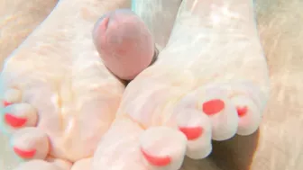 Seduced by a ginger mermaid in an underwater footjob, perfect soles with long red nails.