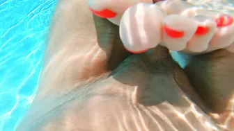 Seduced by a ginger mermaid in an underwater footjob, perfect soles with long red nails.