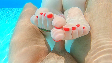Seduced by a ginger mermaid in an underwater footjob, perfect soles with long red nails.