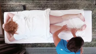 Redhead milf with big boobs gets an oil massage that ends in a creamy pussy licking and hairy pussy cumshot.