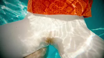 Girl in red dress with hairy pussy gets creampied in pool.