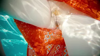 Girl in red dress with hairy pussy gets creampied in pool.