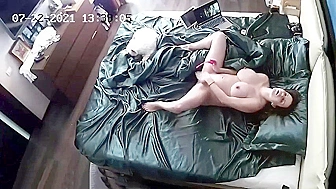 Lady keeps her legs spread as she pets her pregnant pussy in a solo vid