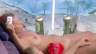 Italian spy cam porn showing a nudist couple enjoying themselves on the beach Italian spy cam porn showing a nudist couple enjoying themselves on the beach