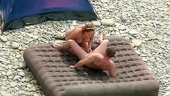 Beach fuck scene showing spy cam action with a horny mature couple of fuckers