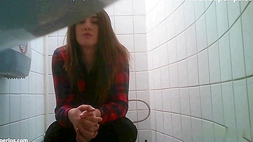 European stepsister looks hot while pissing in front of the camera in spycam XXX