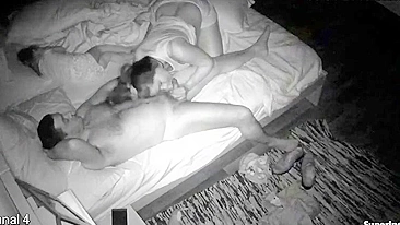 Hidden cam scene showing a horny couple engaging in passionate fucking