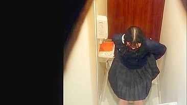 Spy cam video with a teen in a skirt that looks very fcuking horny overall