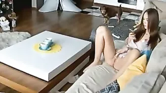 Sofa masturbation session in a hidden cam video with petting and real orgasms