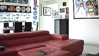 Spy on a nude British babe who decides to play with her cunt on the couch