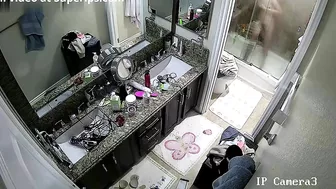 Spy cam footage showing a horny stepsister hitting the showers in the morning