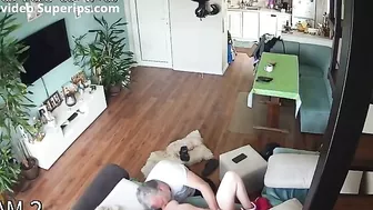 Spy recording of a step-daughter banging her step-dad in the living room