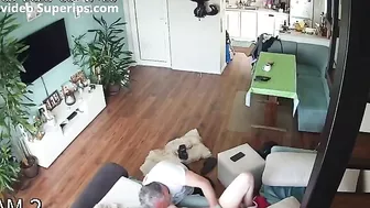 Spy recording of a step-daughter banging her step-dad in the living room