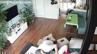 Spy recording of a step-daughter banging her step-dad in the living room