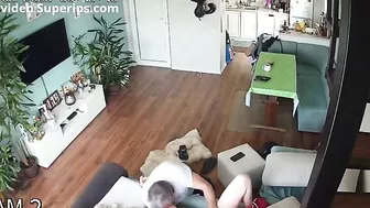 Spy recording of a step-daughter banging her step-dad in the living room