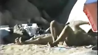 MILF Wife Gets Caught by Voyeur in Public Beach Fun