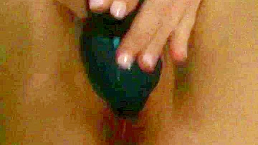 Busty MILF plays with dildo for solo orgasmic bliss