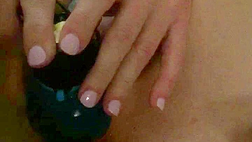 Busty MILF plays with dildo for solo orgasmic bliss