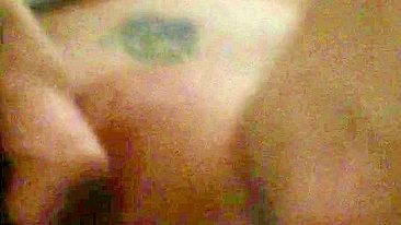 Busty MILF plays with dildo for solo orgasmic bliss