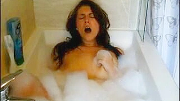 Masturbating Teen with Small Tits Fingers Herself in the Tub!