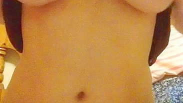 Busty Amateur Teases with Huge Tits in Homemade Masturbation Strip