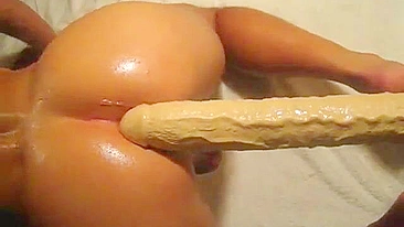 Amateur Masturbates with Huge Dildos in Homemade Anal Sex