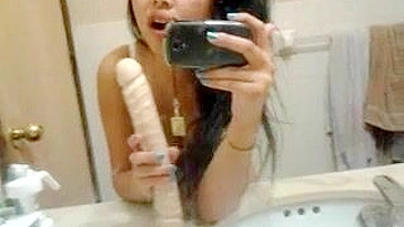 Amateur Asian Teen Masturbates with Dildo in Homemade Selfie