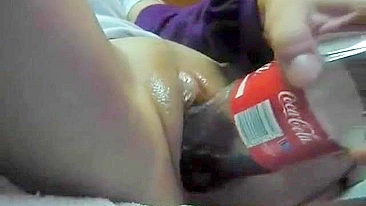 Shaven Teen Pussy Masturbates with Dildo and Coca Cola Bottle!