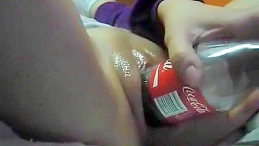 Shaven Teen Pussy Masturbates with Dildo and Coca Cola Bottle!