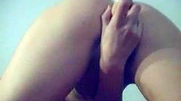 Blonde Masturbates with Dildo and Fingers Both Holes for Ultimate Orgasm