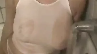 Masturbating Brunette Teases with Big Tits and Wet Panties in Bathtub Striptease