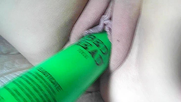Homemade Masturbation with Shaved Pussy and Bottle Dildo