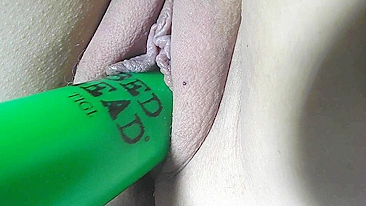 Nicki Shaved Pussy Gets Slippery with a Shampoo Bottle