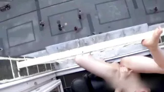 Mad Girl Public Masturbating and Peeing From Balcony On Pedestrians