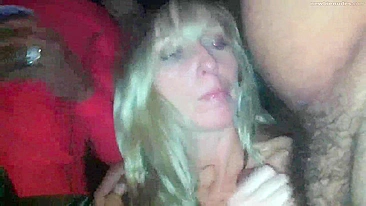 Blonde MILF Gets Gangbanged by Interracial Group in Homemade Swingers' Club
