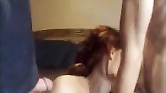 Redhead MILF Swinger Gives Blowjob in Amateur Threesome