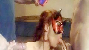 Redhead MILF Swinger Gives Blowjob in Amateur Threesome