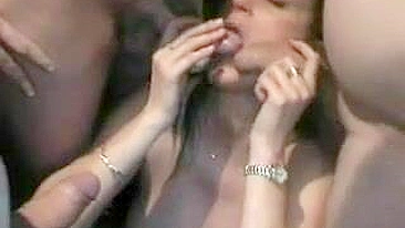 Brunette Swallows Cum in Group Bukkake Amateur Porn