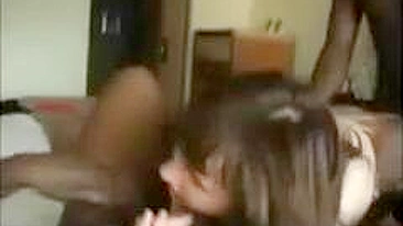 Interracial Amateur Gets Double-teamed by Big Cocks in Hotel Threesome