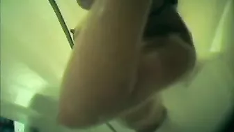 Mom secretly filmed in the bathroom during shower masturbation using a shower nozzle