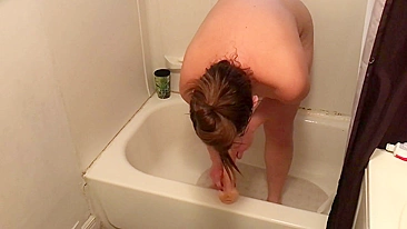 Using my huge dildo in the shower and making myself cum while my hubby watches basketball