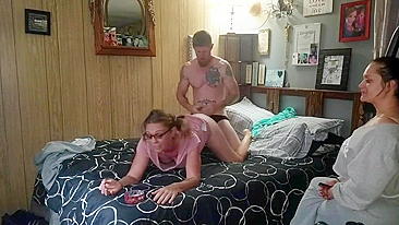 Cuckquean wife watches her GF get fucked hard doggie style while on the phone with BF