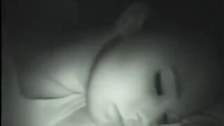 Brother playing while sister sleep, he brings his cock to her mouth.