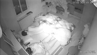 Mother and son in the same bed, a hidden camera caught her masturbating while he sleeps