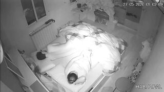 Mother and son in the same bed, a hidden camera caught her masturbating while he sleeps