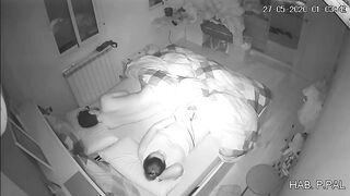 Mother and son in the same bed, a hidden camera caught her masturbating while he sleeps