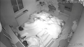 Mother and son in the same bed, a hidden camera caught her masturbating while he sleeps