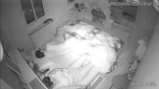 Mother and son in the same bed, a hidden camera caught her masturbating while he sleeps